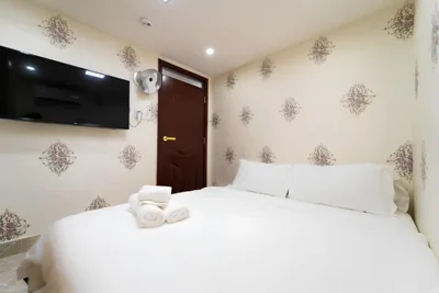 Chambre double économique — The Pivot Suite Ben Thanh - District 1